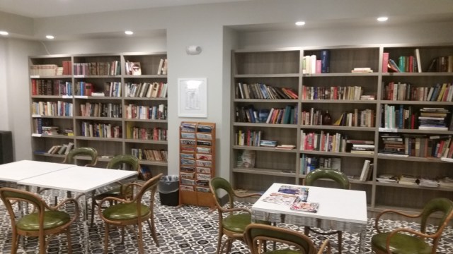 The new library on the South Building. A very short low key campaign resulted in my books donated. The furniture is composed from chairs and tables that once were used in the Aquarius restaurant. When we find funds they will be replaced.