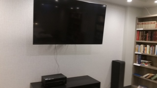 A receiver previously used in the Cascade Room now gives theatrical sound for the new TV set in the Library.